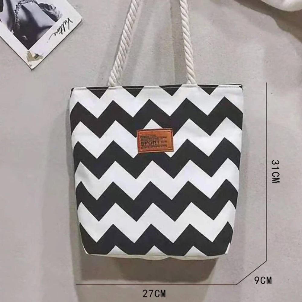 Dollcini Női Kézitáska – Vízálló és Könnyű Műbőr, Fekete-Fehér